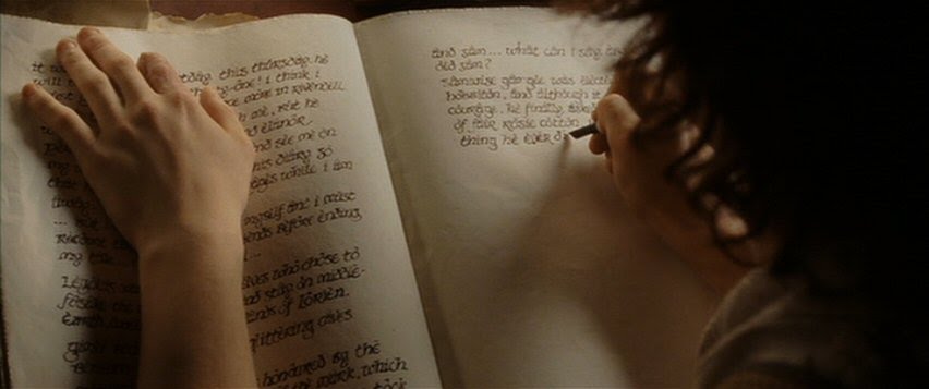 Hobbit writing in large book