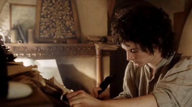 Frodo writing in cozy den while staying home
